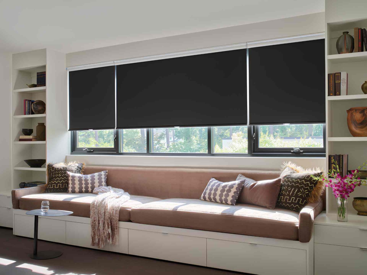 Hunter Douglas Designer Roller Shades in a neutral living room near Stoneham, Massachusetts (MA)
